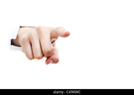Image of human hand making pointing gesture through torn paper Stock Photo