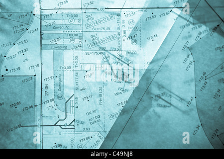 three different layers of blue backlit surveyor's plans Stock Photo