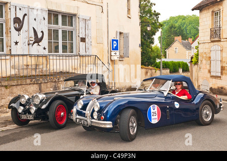 Replica 1930s Jaguar SS100 and Jaguar XK140 Roadster classic cars - France. Stock Photo