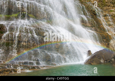 Rainbow in Cola de Caballo waterfall, Ordesa National Park, Pyrenees, Spain Stock Photo