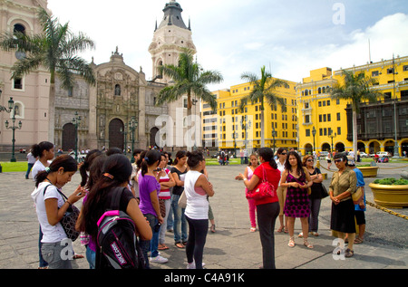 Basilica Cathedral and the Municipal Palace at the Plaza Mayor or Plaza de Armas of Lima, Peru. Stock Photo