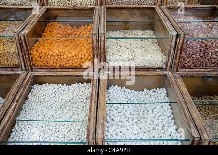 Several kind of traditional turkish nuts kept in glass panes Stock Photo