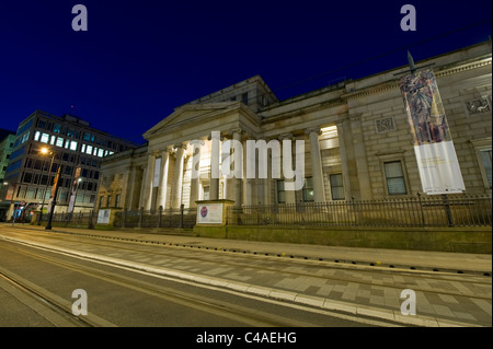 The Grade I listed Manchester Art Gallery building located on Mosley Street in the city centre of Manchester, UK, at night.