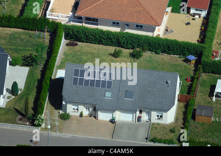 Aerial view of private house with photovoltaic panels on roof, France Stock Photo