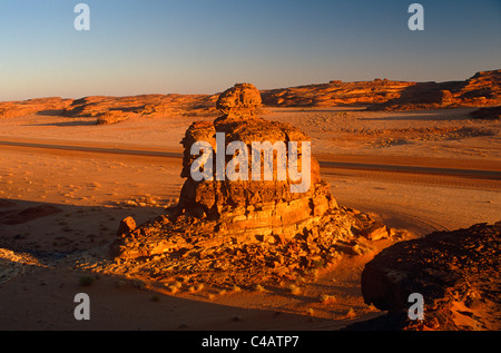 Saudi Arabia, Madinah, nr. Al-Ula. Rocky stacks and bluffs dot the stark landscapes on the edge of the Nefud (aka Nafud) Desert. Stock Photo