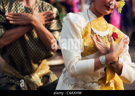 Thailand, Sakhon Nakhon, Sakhon Nakhon.  Fawn Thai dancers perform during the Wax Castle festival in Sakhon Nakhon. Stock Photo