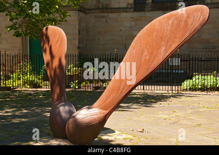 Sycamore Seed.  A sculpture by Andrew McKeown. St Phillip's Square, off Chapel Street, Salford, Manchester, England, UK Stock Photo