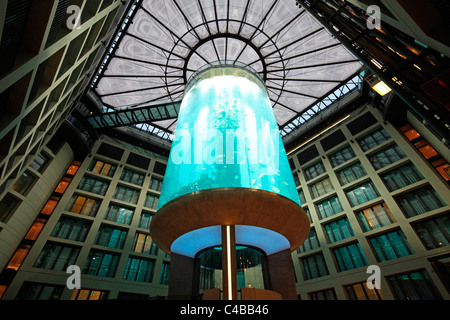 Atrium of the DomAquarée Hotel with a massive aquarium in the middle. Berlin, Germany Stock Photo