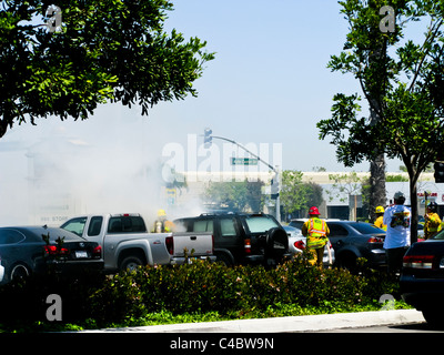 Firefighters working on an SUV fire in Oxnard California Stock Photo