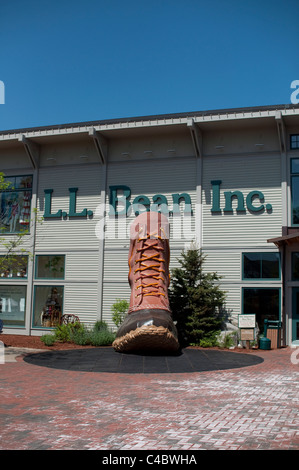 A giant sculpture of the Bean hunting boot greets shoppers at the entrance to L.L. Bean in Freeport, Maine, USA. Stock Photo