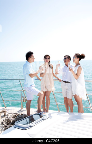 Friends Relaxing on a Yacht Stock Photo