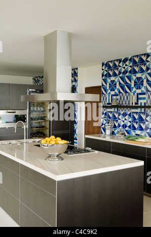 modern kitchen with blue and white tiling in a villa in Spain Stock Photo