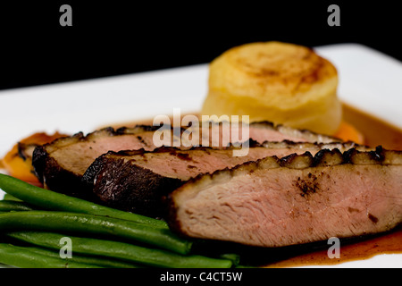 A beef dish prepared by a professional chef Stock Photo