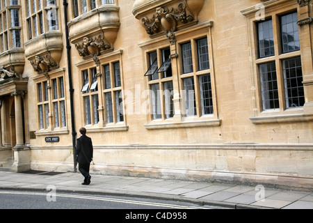 Oxford University Student walking on Catte Street Stock Photo