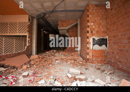 Lorca Spain earthquake building scene. Large destructive earthquake with collapsed buildings and destruction. Business interior. Stock Photo