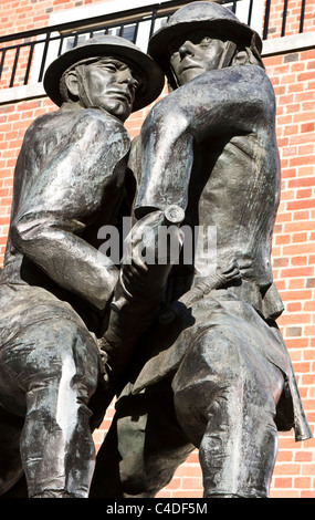 Bronze national firefighters memorial by John W Mills near St Paul's Cathedral City of London England Europe Stock Photo