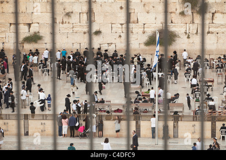 Jewish men praying at the Wailing Wall, Jerusalem, Israel. Stock Photo