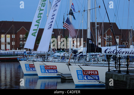 Clipper Race yachts moored in Hull Marina at dusk, East Yorkshire, England