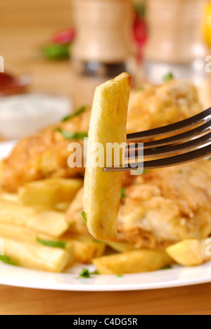 French fries, fish, mayo and spices Stock Photo