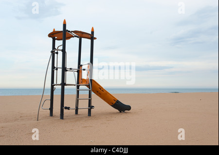 Colorful chute on a lonely beach in evening light Stock Photo