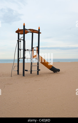 Colorful chute on a lonely beach in evening light Stock Photo