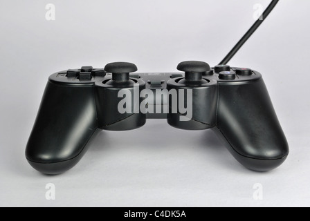 gamepad also called joypad or control pad a type of game controller held in the hand  on white background Stock Photo