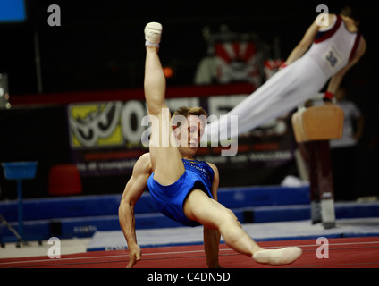 gymnastics competition: Enrico Pozzo the Italian national team gymnast is performing his floor routine Stock Photo