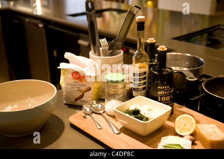 Counter top with cooking ingredients for lesson at Jamie Oliver's Recipease Stock Photo