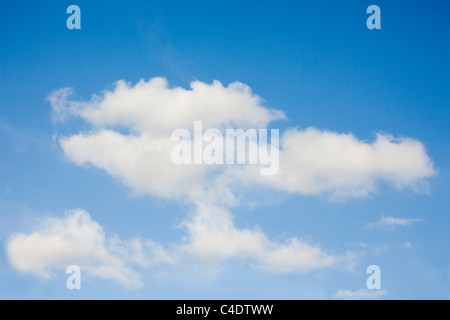 Puffy cloud formation in a blue sky Stock Photo