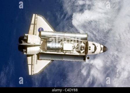 Space shuttle Discovery viewed from above in orbit Stock Photo