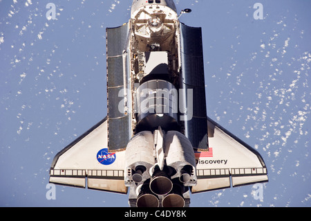 Space shuttle Discovery viewed from above in orbit Stock Photo