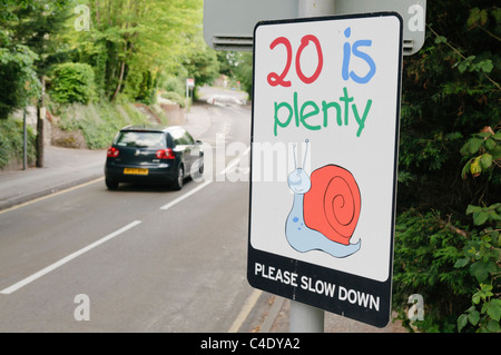 20 is plenty speed limit road signs 30 mph english village England UK ...