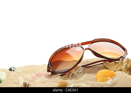 summer holidays memories from beach with shells and sunglasses on sand Stock Photo