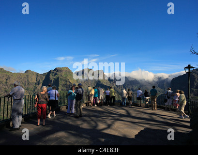 Tourists at Eira do Serrado, viewpoint overlooking the Nuns Valley , Madeira. Stock Photo