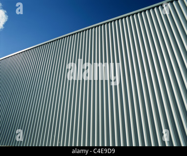 Cose-up of a corrugated irion metal facade of a factpry building in France Stock Photo