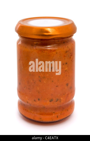 Glass jar of tomato sauce isolated on white Stock Photo