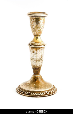 Old tarnished candlestick holder isolated on white Stock Photo