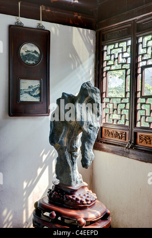 Scholars' rock displayed in the Humble Administrator's Garden (Zhuo Zheng Yuan), Suzhou, China. Stock Photo