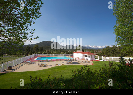 The swimming pool at the Stanley Hotel in Estes Park, Colorado provides for spectacular views of the Rocky Mountains Stock Photo