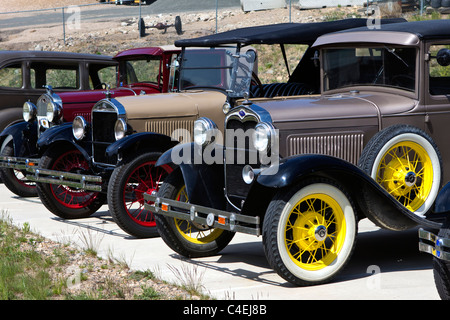 Estes Park, Colorado - A row of Model A Ford automobiles produced between 1927 and 1931 line a parking lot. Stock Photo