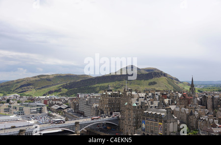 Arthur's Seat and Salisbury Crags in the distance in a view of Edinburgh's Old Town from the top of the Scott Monument Stock Photo