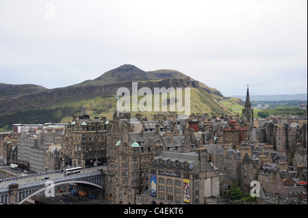 A view of Edinburgh's Oldtown on the Southside of the city with Arthur's Seat and Salisbury Crags in the distance Stock Photo