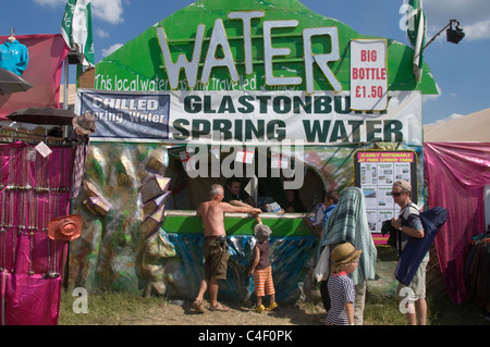 water stall glastonbury festival selling glastonbury spring water Stock Photo