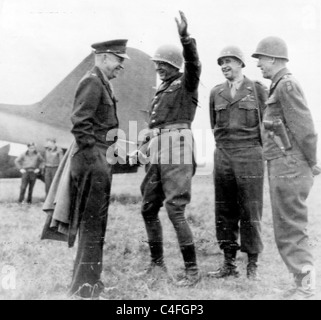 General Eisenhower meeting with generals Patton, Bradley, and Hodges on an airfield somewhere in Germany. 1945 Stock Photo