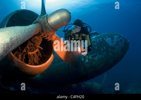 Scuba diver at a sunken airplane Douglas C 47 Dakota, Bodrum, Turkey Stock Photo