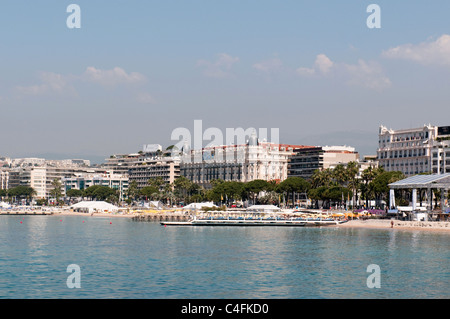 Coastline and Croisette bulevard with luxury hotel in Cannes, France.