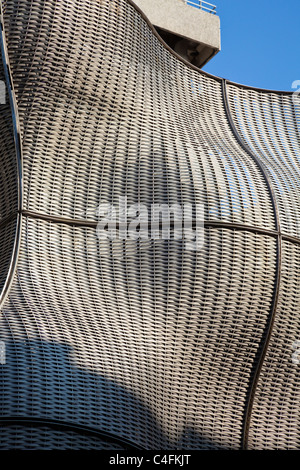 Architectural metal screen on building adjacent to Guy's Hospital tower, London, UK Stock Photo