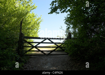 Farm gate and footpath signpost near to the hamlet of South Stoke in West Sussex. Stock Photo