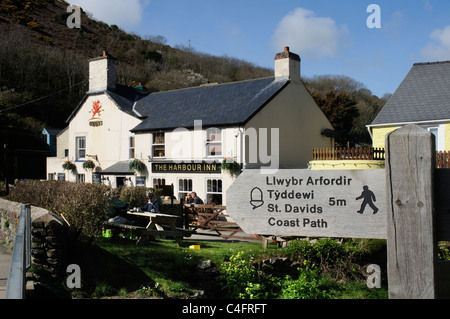 A sign and a pub at Solva on the Pembrokeshire National Park coast path Stock Photo