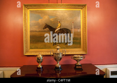 Gold Cups and Horse painting, the Jockey Club, Newmarket Suffolk UK Stock Photo